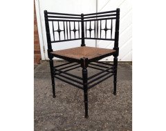 Liberty & Co. An Aesthetic Movement ebonised corner chair and side chair after a design by Ford Maddox Brown. - Thumbnail 2