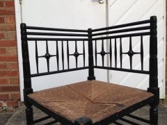 Liberty & Co. An Aesthetic Movement ebonised corner chair and side chair after a design by Ford Maddox Brown. - Thumbnail 6