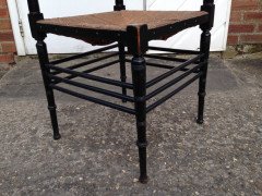 Liberty & Co. An Aesthetic Movement ebonised corner chair and side chair after a design by Ford Maddox Brown. - Thumbnail 7