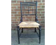 Liberty & Co. An Aesthetic Movement ebonised corner chair and side chair after a design by Ford Maddox Brown. - Thumbnail 8