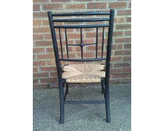 Liberty & Co. An Aesthetic Movement ebonised corner chair and side chair after a design by Ford Maddox Brown. - Thumbnail 10