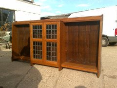 Liberty & Co. A quality Arts & Crafts Oak breakfront cascading waterfall bookcase - Thumbnail 1