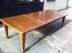 A Well-Crafted twelve seater Arts & Crafts extending Oak dining table with two extra leaves. - Thumbnail 1
