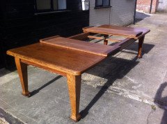 A Well-Crafted twelve seater Arts & Crafts extending Oak dining table with two extra leaves. - Thumbnail 6