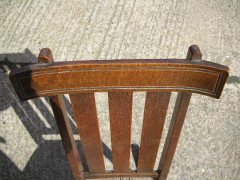 An Arts & Crafts Oak rocking chair - Thumbnail 4