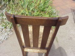 An Arts and Crafts oak rocking chair - Thumbnail 6