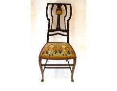 Liberty & Co. An Arts Crafts inlaid mahogany side chair. - Thumbnail 2