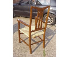 Liberty & Co. A set of three rush seat dining chairs in the manner of C. F. A Voysey - Thumbnail 5