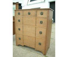 An Arts & Crafts Oak inlaid chest of drawers - Thumbnail 2