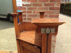 An impressive Arts and Crafts oak dressing table with pewter and ebony stylised floral inlays. - Thumbnail 7