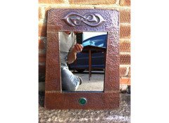 Liberty & Co. A Glasgow Style Arts & Crafts copper mirror - Thumbnail 1