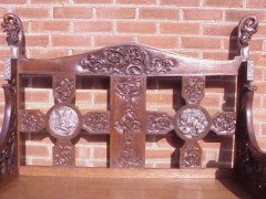 A Celtic Arts & Crafts carved Oak settle with carved dragons to the tops - Thumbnail 7