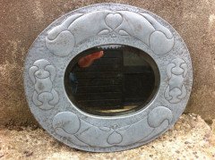 An Arts & Crafts pewter mirror with decorative heart and abstract line details - Thumbnail 1