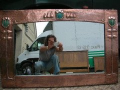 Talwin Morris, Style of. A Glasgow School mirror with stylised floral repousse copper work - Thumbnail 1