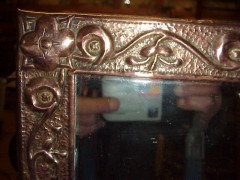 John Pearson. Arts & Crafts copper mirror with typical hand repousse stylised floral details. - Thumbnail 2