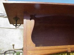 An Arts & Crafts Oak hall robe with flaring cornice and twizzling coat hooks to each side - Thumbnail 3