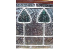 E. A. Taylor for Wylie & Lochhead. An Arts & Crafts display/sideboard with green glass Voysey style tree details - Thumbnail 5