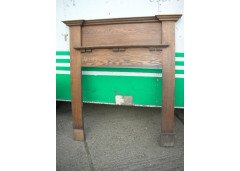 An Arts & Crafts Oak fire surround - Thumbnail 1
