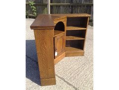 Liberty & Co. An Arts & Crafts Oak corner bookcase - Thumbnail 3