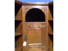Liberty & Co. An Arts & Crafts Oak corner bookcase - Thumbnail 5