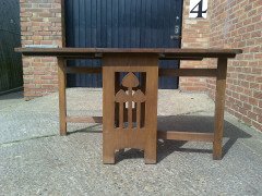 Liberty & Co. A Well-Crafted large Arts & Crafts Oak drop leaf dining - Thumbnail 1