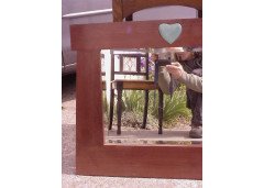 An Arts & Crafts mahogany style mirror with subtle angular form with a light blue Ruskin Heart to the top - Thumbnail 2