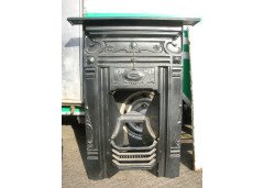 Arts & Crafts fireplace with stylised floral details - Thumbnail 1