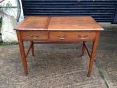 Marsh Jones & Cribb. A Number of Two-drawer Oak Desks