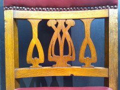 Shapland & Petter. An Arts & Crafts Oak 14 seater extending dining table with three leaves and eight matching chairs - Thumbnail 16