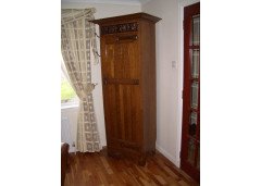 A Well-Crafted Arts & Crafts Oak hallrobe and matching hallseat - Thumbnail 1