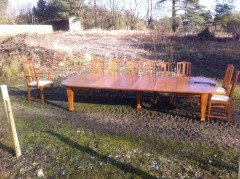 A fourteen seat Arts & Crafts Oak 'D' end extending dining table with four extra leaves. - Thumbnail 1