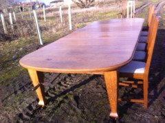 A fourteen seat Arts & Crafts Oak 'D' end extending dining table with four extra leaves. - Thumbnail 2