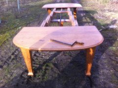 A fourteen seat Arts & Crafts Oak 'D' end extending dining table with four extra leaves. - Thumbnail 5
