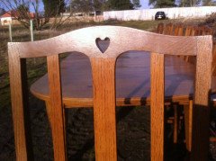 A fourteen seat Arts & Crafts Oak 'D' end extending dining table with four extra leaves. - Thumbnail 16