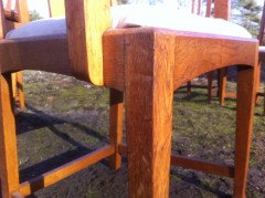 A fourteen seat Arts & Crafts Oak 'D' end extending dining table with four extra leaves. - Thumbnail 19