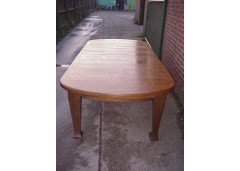 An Arts & Crafts 'round ended' wind-out extending dining table - Thumbnail 1