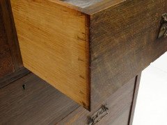 An Arts & Crafts Oak chest of drawers with good stylised copper handles - Thumbnail 5