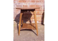 Liberty & Co., attributed. A Large Octagonal Arts & Crafts Oak Side Table with Moorish Detailing - Thumbnail 2