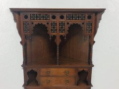 Liberty & Co. A walnut corner cupboard in the Moorish style. - Thumbnail 3
