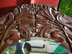 A large Arts & Crafts Oak mirror with floral carving of superior craftsmanship. - Thumbnail 4