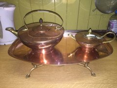 W. A. S. Benson. A copper and brass warming tray, with stylised feet. - Thumbnail 2