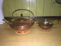 W. A. S. Benson. A copper and brass warming tray, with stylised feet. - Thumbnail 3
