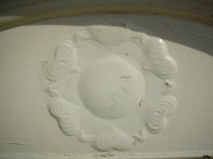 An Arts & Crafts white cast iron fireplace - Thumbnail 3