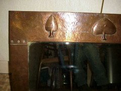 Liberty & Co. A copper mirror with hand formed stylised tree designs after a design by C. F. A Voysey - Thumbnail 2