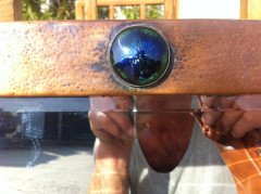 Liberty & Co. An Arts & Crafts copper mirror with blue enamel roundel - Thumbnail 4