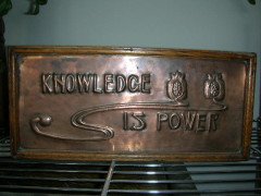 A wonderful Arts & Crafts Oak book trough with copper panel - Thumbnail 1