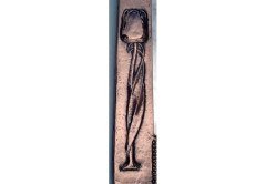 Liberty & Co. A copper mirror with hand formed stylised floral repousse work - Thumbnail 2