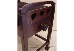 Liberty & Co. A mahogany piano stool with heart cut-outs to each side and adjustable seat - Thumbnail 2