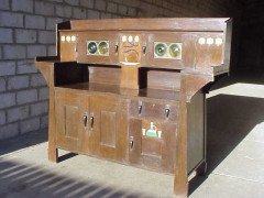 Leonard Wyburd for Liberty & Co. A fabulous Liberty & Co. Arts & Crafts Oak sideboard - Thumbnail 1