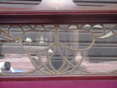 Shapland & Petter. A fantastic mahogany desk inlaid with stylised flowers of various fruit woods - Thumbnail 6